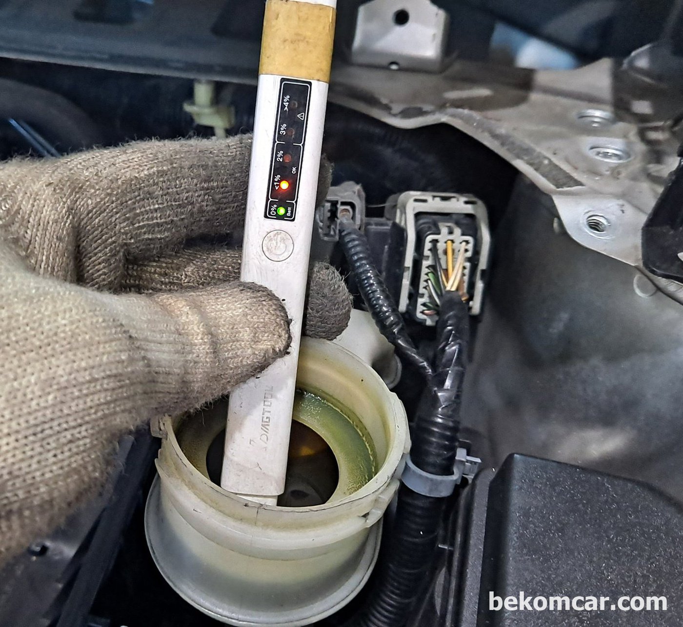 브레이크오일 수분함량 약 1%로 아직 정상범위이고 오염도 역시 없다. 1년후 재점검한다.|bekomcar.com